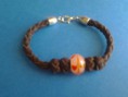 Pulsera de cuero con nudos y bola de cristal